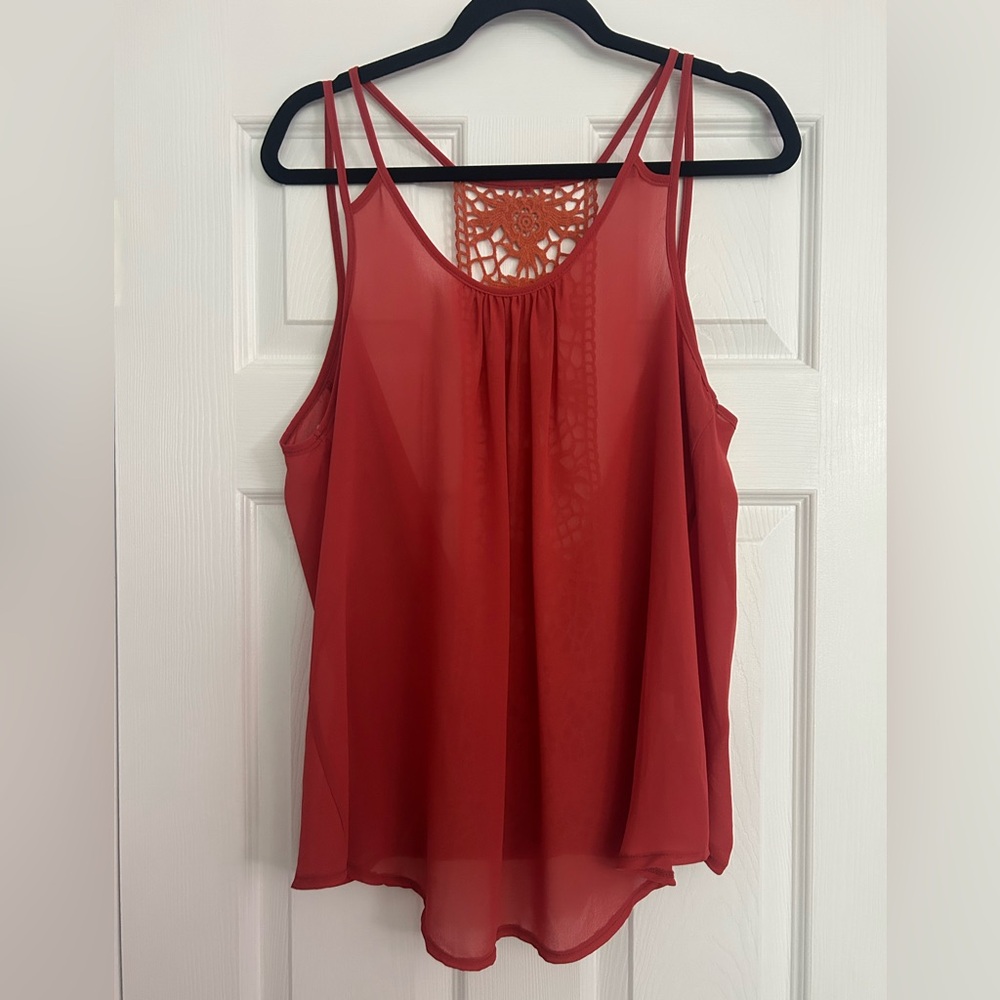 Elegant Callie Mac Top with lace detail and cris-cross back.